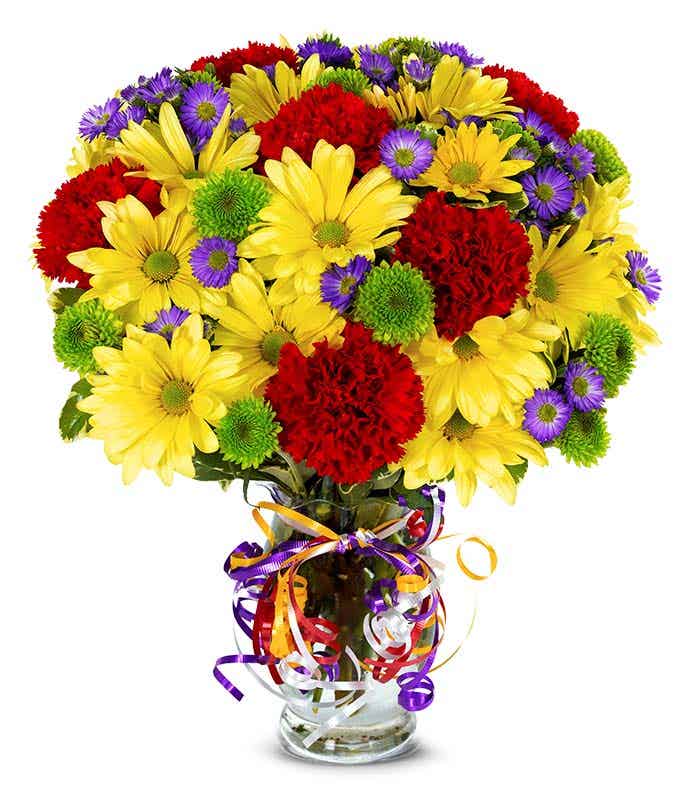 Yellow daisies with red carnations and green poms