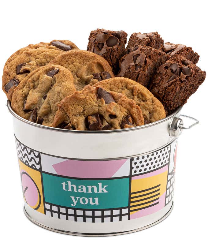 A Thank You bucket filled with David's cookies and brownies. The bucket features a colorful design with thank you-themed decorations. The assortment includes chocolate chip cookies and chocolate brownies.