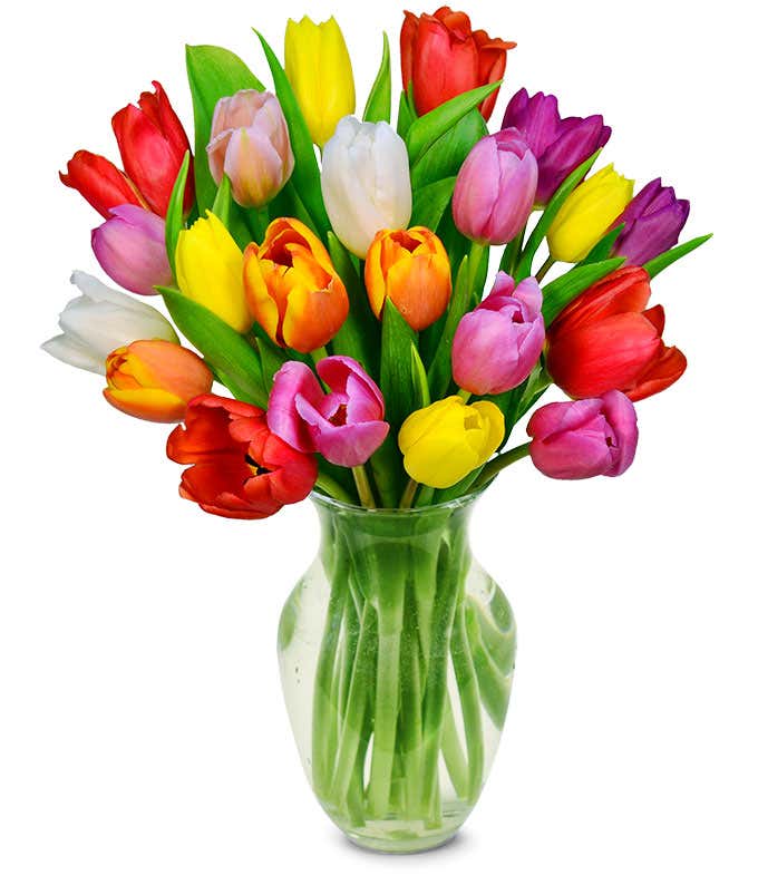 Bouquet of 20 vibrant rainbow tulips with optional elegant glass vase and personalized gift message for a new baby.