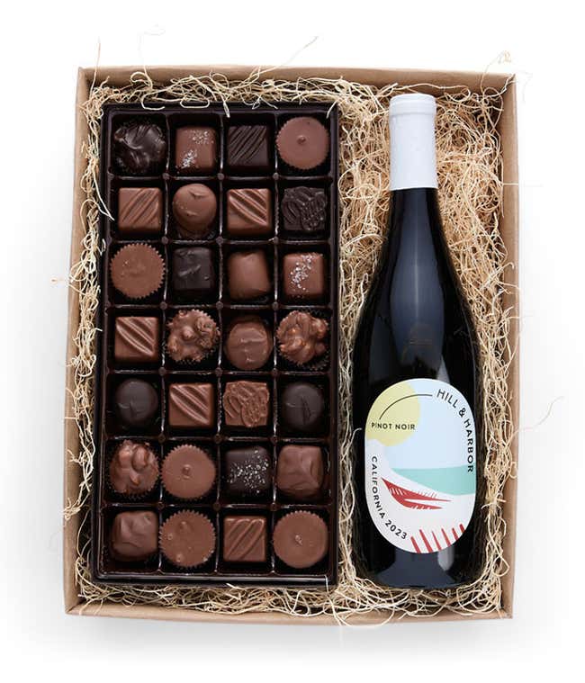 a bottle of California Pinot Noir paired with a 1lb box of 28 assorted gourmet chocolates