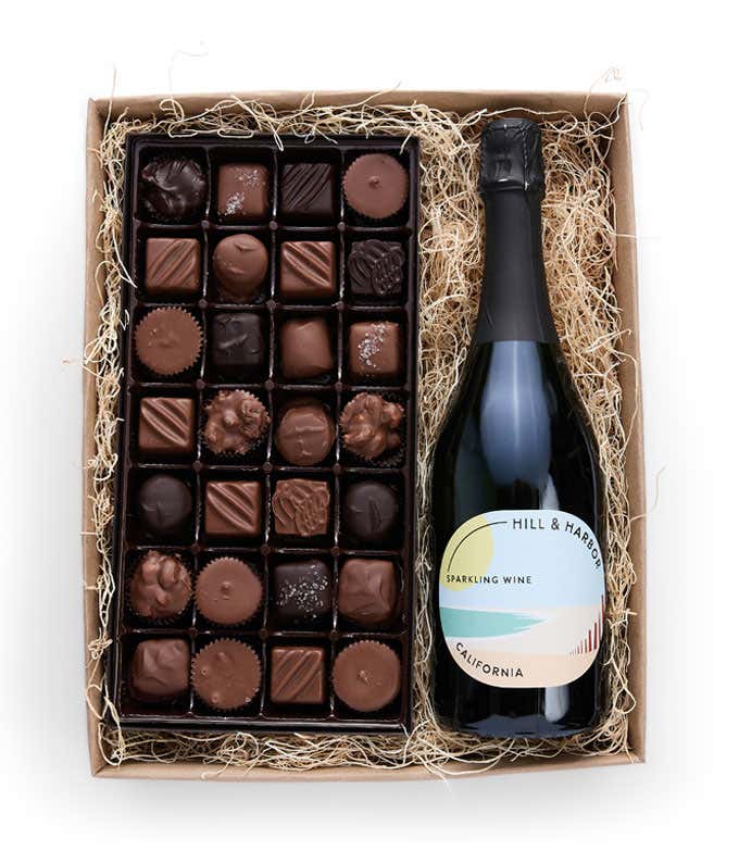 A bottle of California Sparkling Wine by Hill and Harbor paired with a 1lb box of 28 assorted gourmet chocolates.  A refined combination for any occasion.