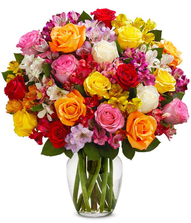 A bouquet featuring mixed roses and alstroemerias, with an optional vase.