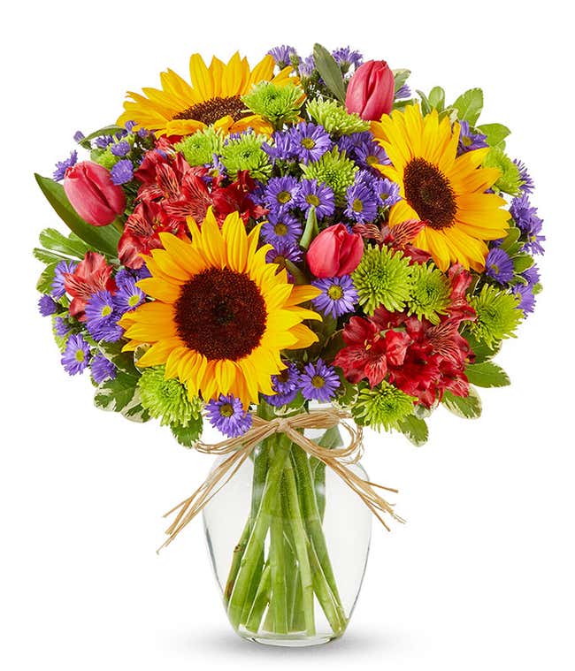 Sunflowers and pastel flowers for Mother's Day delivery