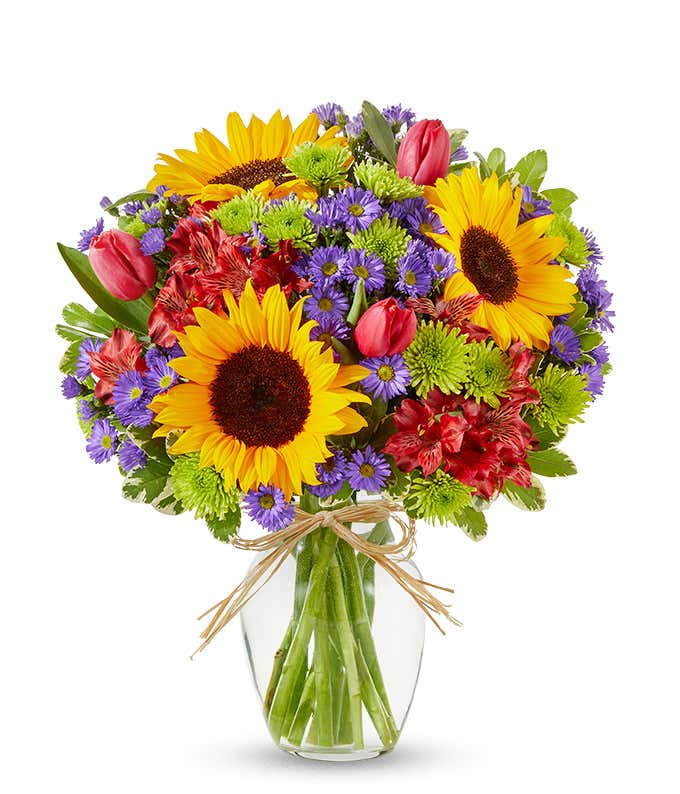 Sunflowers and pastel flowers for Mother's Day delivery