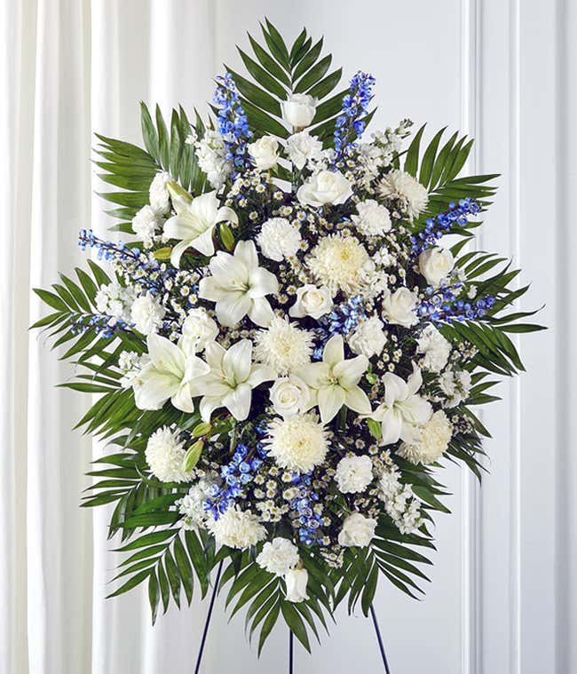 Blue delphinium and white flower standing spray