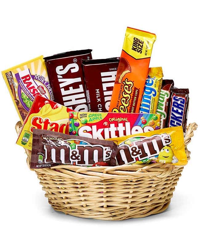 A delightful variety of chocolates and candies, presented in a keepsake basket. This sweet assortment offers a perfect gift for any occasion, combining delicious treats with a charming keepsake.