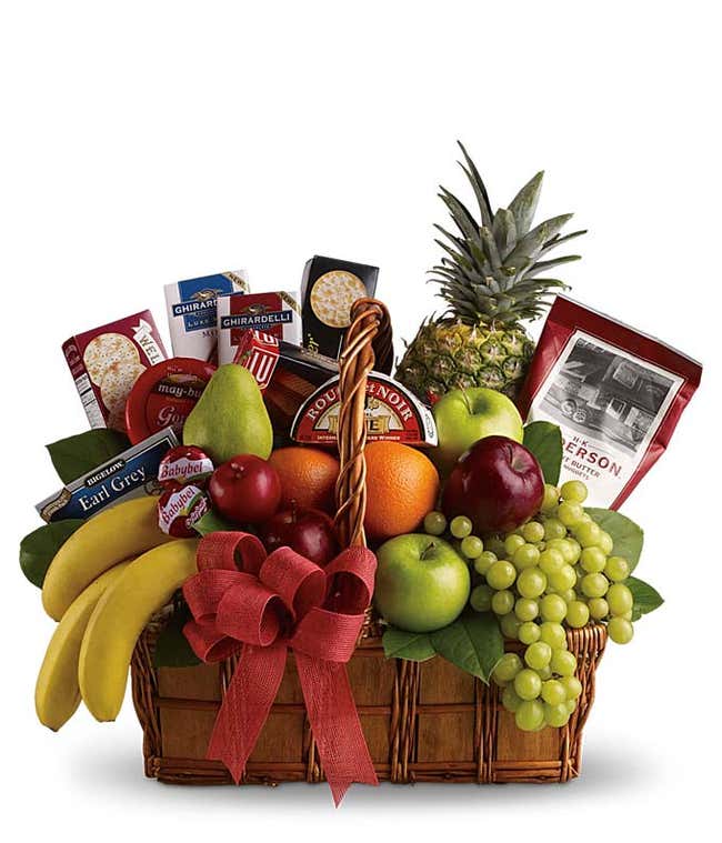 Apples, pears, orange, grapes, bananas &amp; pineapple with cheese, crackers, tea &amp; other savory snacks in a natural gift basket with a bow.